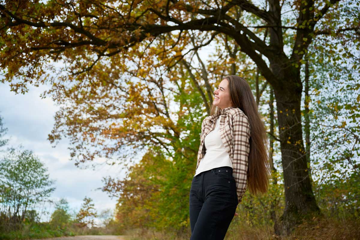 Enjoying a peaceful moment in a beautiful autumn forest during golden hour